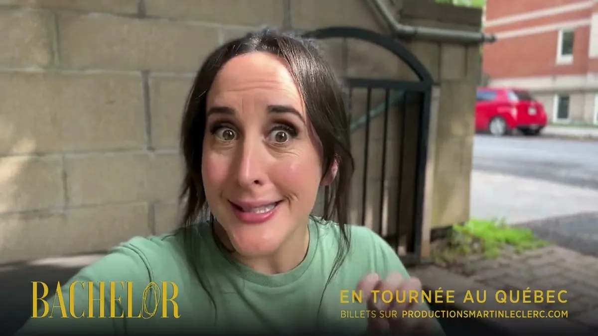 Monika Pilon, a woman with dark hair in a green T-shirt, talking to the camera outside a building, with a theatre poster caption.